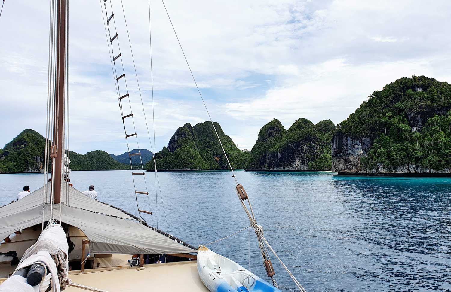 Private luxury yacht travel experience in Raja Ampat, seen from the boat deck